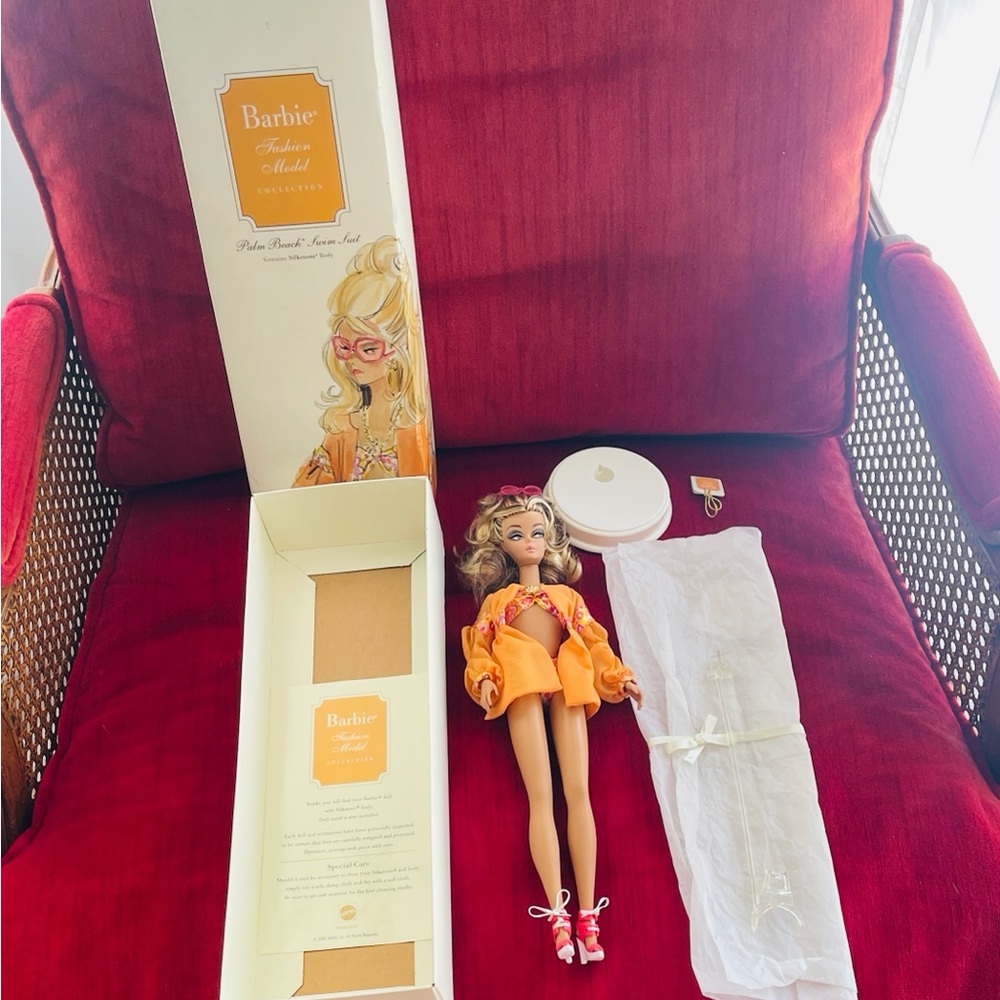 Barbie Fashion Model in Vibrant Orange Ensemble. Palm Beach swimsuit Barbie
